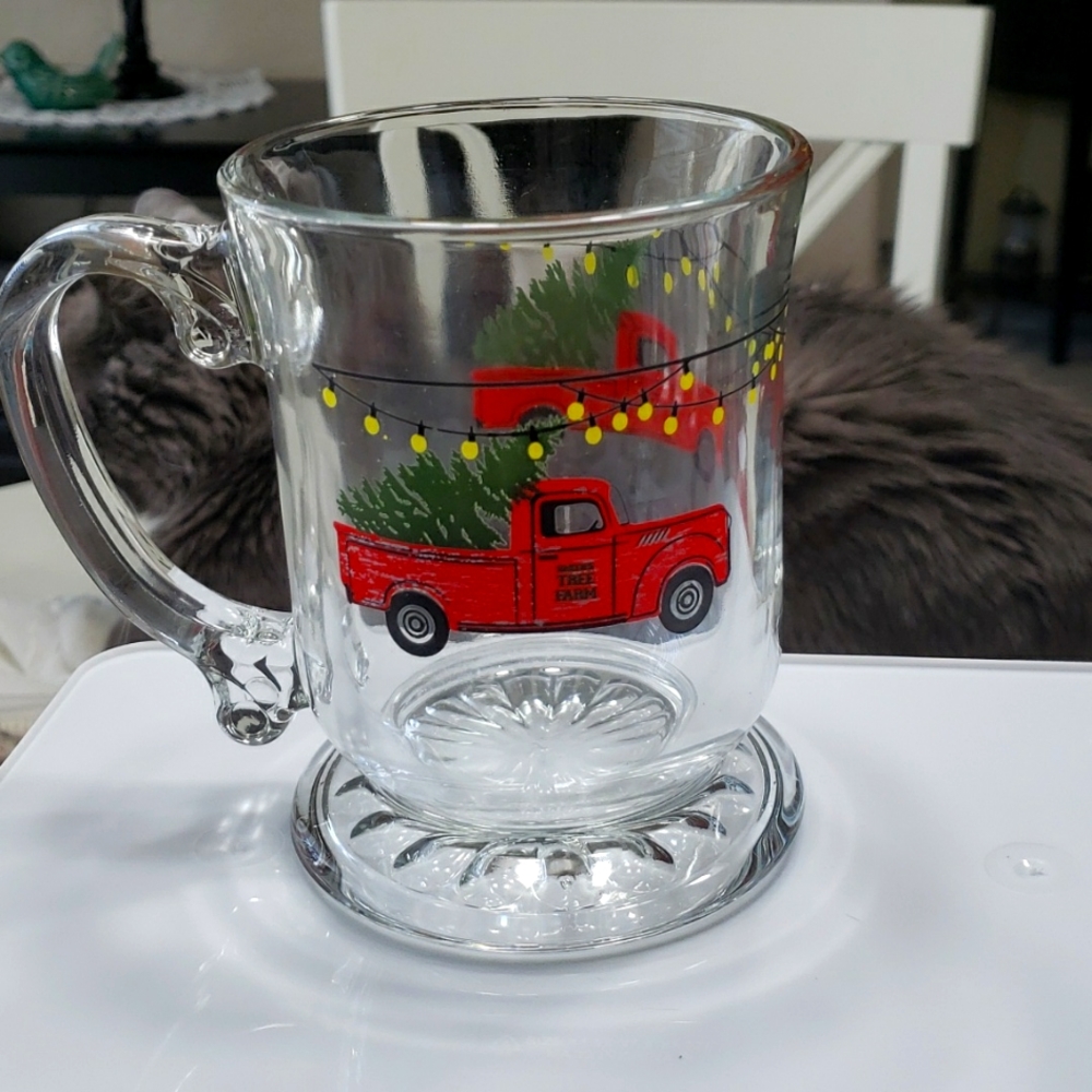 4 red truck glass mugs, selling all 4 as a set.